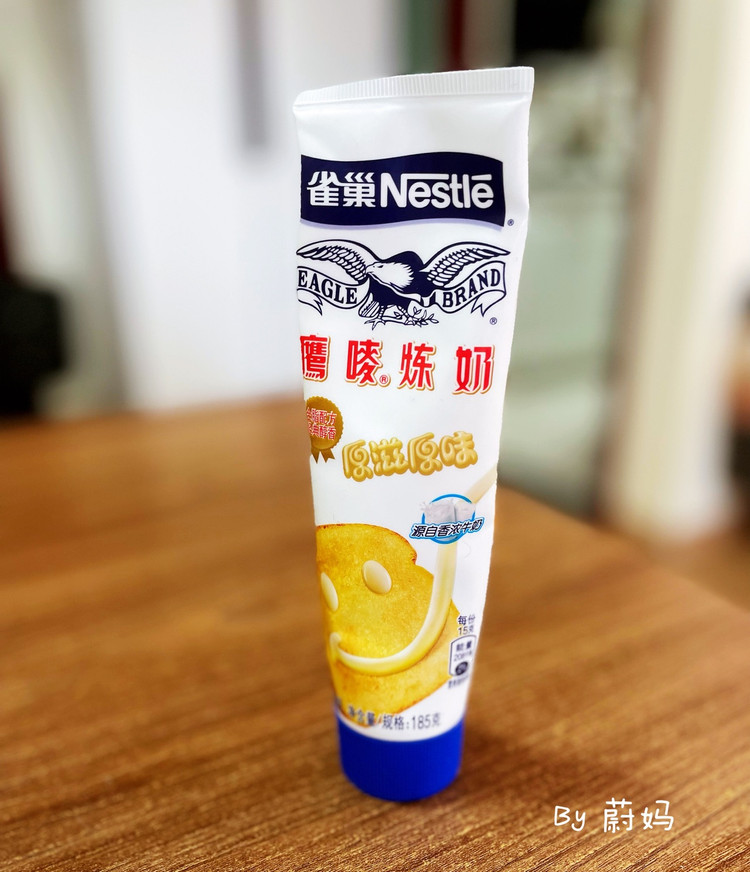 孩子放假的日子不用早起，早餐都是很简单，昨晚用面包机做了炼奶吐司🍞，材料放好，早上起来面包就做好了，第一次做炼奶吐司，发得特别好，味道很不错👍图4